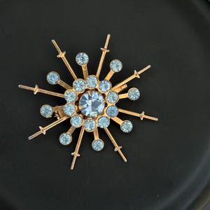 Broche de estrella atómica cósmica Bernela vintage (en tarjeta original) con diamantes de imitación de zafiro azul claro y tono dorado