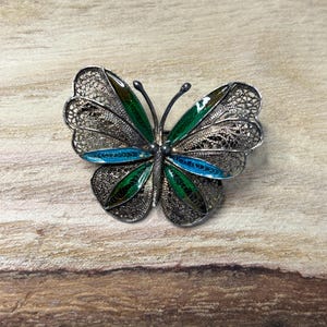 Vintage zilveren filigraan en emaille vlinderbroche jaren 30