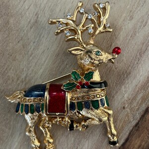 Broche articulado e saltitante vintage Rudolph, a rena do nariz vermelho