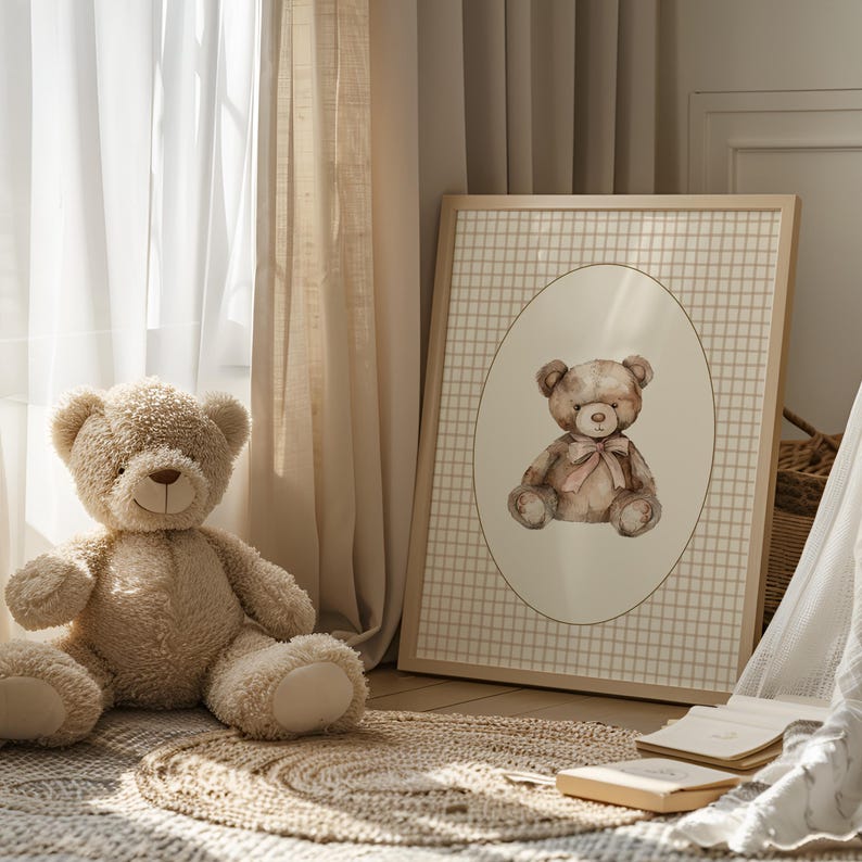May include: A framed print of a brown teddy bear with a pink bow sitting in a white oval on a beige and brown gingham background.