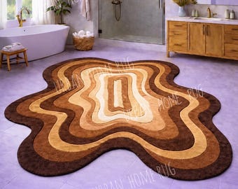 Alfombra abstracta ondulada, moderna en marrón y beige, diseño orgánico, para baño de lujo.