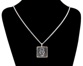 Adinkra "Endurance" Burnished Steel Ceramic and Silverplate Necklace