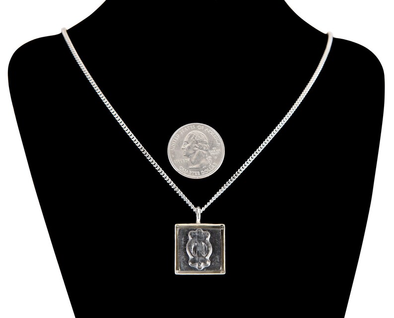 Adinkra Endurance Burnished Steel Ceramic and Silverplate Necklace image 2