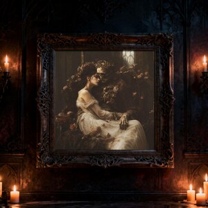 May include: A framed wall art piece depicting a person in a flowing white gown seated beside a skeletal figure adorned with dark roses. The ornate, dark-toned frame features intricate carvings, and the artwork is set against a dim, moody background.