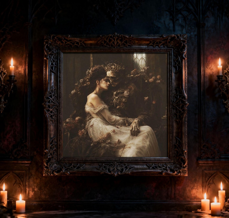 May include: A framed wall art piece depicting a person in a flowing white gown seated beside a skeletal figure adorned with dark roses. The ornate, dark-toned frame features intricate carvings, and the artwork is set against a dim, moody background.