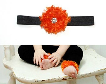 Zwart en oranje Halloween baby beenwarmers en hoofdband