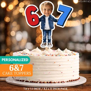 May include: A white frosted cake with colorful sprinkles and a personalized cake topper. The topper features a cartoon image of a child holding the numbers 6 and 7. The text "PERSONALIZED 6 & 7 CAKE TOPPERS" is also visible.