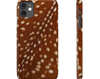 May include: A brown and white deer print phone case for an iPhone. The case has a cutout for the camera lens.