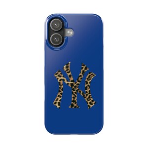 May include: A blue phone case featuring the New York Yankees logo in a leopard print design. The case has a glossy finish and a camera cutout at the top.