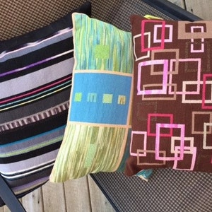 Choose one, hand made one of a kind needlepoint pillows sewn with silk and other threads