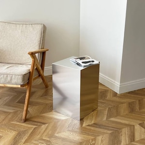 Metal minimalism table. Aluminum coffee table. Bedside table. Designer furniture. Home decor.