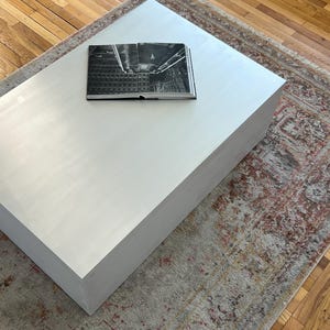 Metal coffee table. Living room table. Modern designer furniture. Side table.