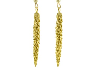 May include: A pair of gold-tone dangle earrings with a textured, pine cone-shaped design.