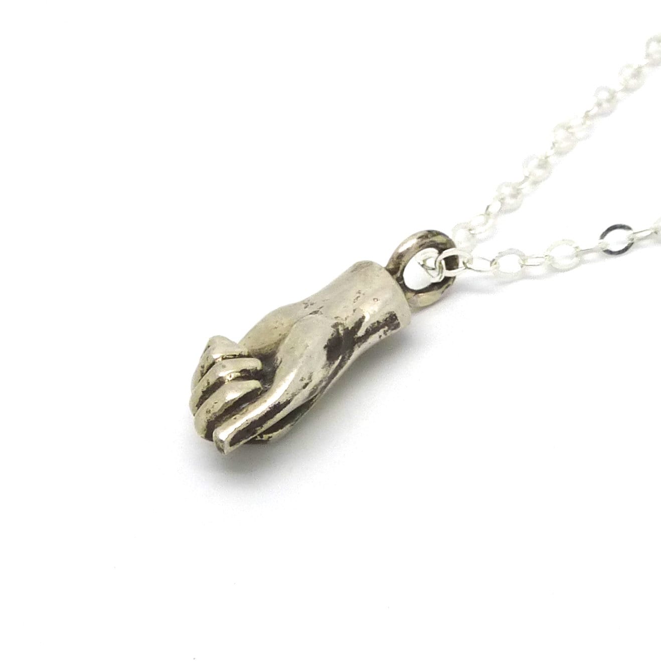 Tiny Silver Fist Necklace- Symbol of Strength and Unity