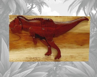 Carver Dan's - Dinosaurio, T-Rex, una caja de regalo de madera artesanal. Una caja rompecabezas con un compartimento secreto.