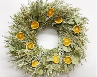 Dried citrus, floral and eucalyptus wreath