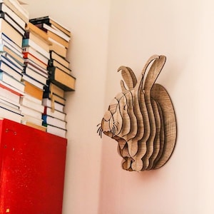 Lapin en forme de puzzle 3D. Le projet est disponible en trois tailles avec des instructions de montage téléchargeables.