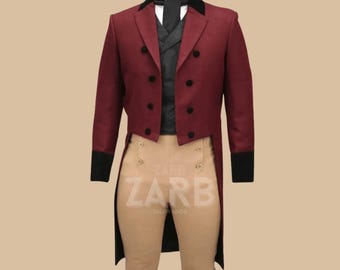 May include: A formal burgundy suit with black detailing, comprising a double-breasted jacket, waistcoat, and trousers. The jacket has black lapels and cuffs. The trousers are tan with decorative buttons. The suit is tailored for formal events.