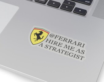 May include: A sticker with the Ferrari logo and the text "@Ferrari Hire Me As A Strategist".