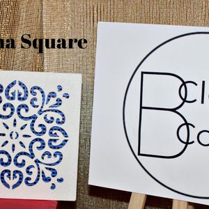 May include: A white square tile with a blue and white geometric pattern. The tile is labeled "Ramona Square". The tile is next to a white sign with a black circle and the text "Clever Covers" inside the circle.