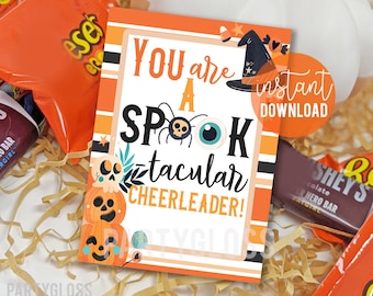 May include: Orange and black printable Halloween card with the text "You are a Spooktacular Cheerleader!" with a witch's hat, spider, and eye graphic.  The card is an instant download.
