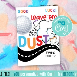 May include: A white printable tag with a golf ball graphic and the text "GOOD LUCK! Leave 'em in the DUST" in colorful letters. The tag also includes the text "PERSONALIZE WITH Corjl" in a circle with a blue background. The tag is 2.5 x 3.5 inches.