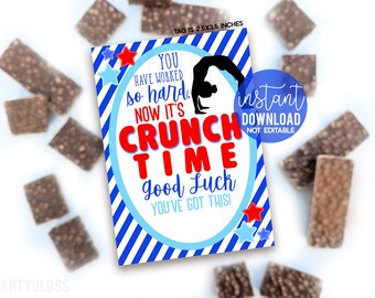 May include: A blue and white striped tag with red text that says "You have worked so hard. Now it's Crunch Time. Good Luck. You've got this!"  A silhouette of a gymnast doing a handstand is in the center of the tag. The tag is 2.5 x 3.5 inches.
