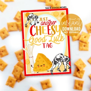 May include: A red and yellow printable tag with the text "Just another cheesy good luck tag" and a cartoon image of a wedge of cheese with arms and legs. The tag is 2.5x3.5 inches.