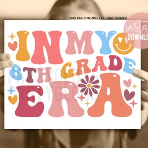 May include: A white 8x10 inch printable file with the text "IN MY 8TH GRADE ERA" in retro-style, colorful bubble letters. The design includes hearts, stars, and a smiley face. The words "INSTANT DOWNLOAD" are also visible.