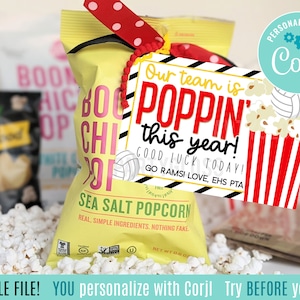 May include: A printable gift tag with a red and white popcorn bucket design. The text reads "Our team is POPPIN' this year! Good luck today! Go Rams! Love, EHS PTA". The tag is personalized with the text "Corjl" and is editable.