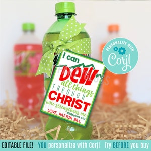 May include: A green soda bottle with a green and white polka dot bow tied around the neck. A white tag with red and black text is attached to the bow. The tag reads "I can Dew all things through CHRIST who strengthens me Philippians 4:13 LOVE, PASTOR BILL". A blue circle with white text reads "PERSONALIZE WITH Cori!"