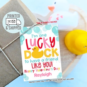 May include: A Valentine's Day card with a yellow rubber duck and the text "I'm one lucky duck to have a friend like you! Happy Valentine's Day Rayleigh".