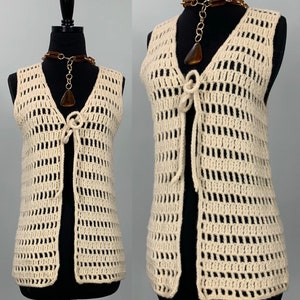 White crochet shop vest