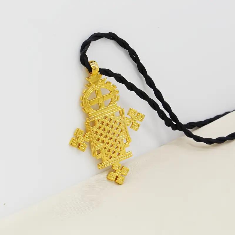 Ethiopian Orthodox Christian Gold Axum Cross Necklace on Black