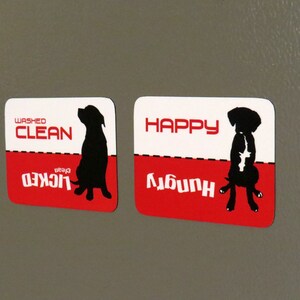 May include: Two red and white rectangular dog magnets with black silhouettes of dogs. The top magnet says "WASHED CLEAN" and the bottom says "LICKED CLEAN". The second magnet says "HAPPY" on the top and "HUNGRY" on the bottom.
