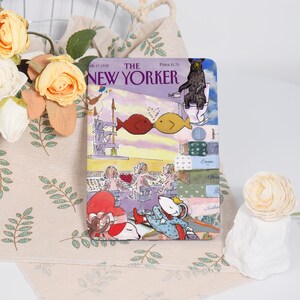 May include: A vintage New Yorker magazine cover featuring a colorful illustration of a bear sitting on a toilet, a fish with a heart, and a mouse wearing a crown. The cover is dated Feb. 17, 1992 and the price is $1.75.