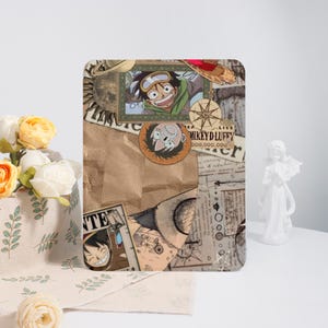 May include: A collage of vintage-style images featuring the anime character Monkey D. Luffy from One Piece. The images include a compass, a globe, and a map. The background is a brown paper texture.