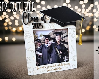 May include: A laser-cut photo frame with a graduation theme. The frame features the text "Class of 2025" and a graduation cap. The frame holds a photo of three graduates. The text "The road to success starts with the first step. Take it confidently" is also included.
