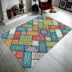 May include: A colourful area rug with a geometric pattern of squares and circles. The rug features a variety of colours, including blue, green, red, orange, yellow, and brown.