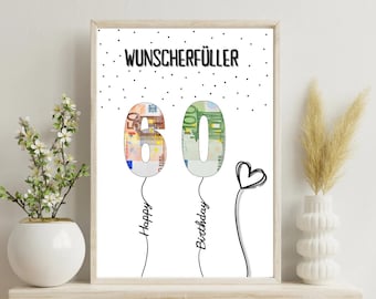 Op de afbeelding: Een rechthoekige ingelijste print met de Duitse tekst WUNSCHERFÜLLER bovenaan en zwarte stippen. Daaronder is het getal 60 afgebeeld als twee ballonnen gevuld met Euro-bankbiljetpatronen, met de woorden Happy Birthday en een hartje.