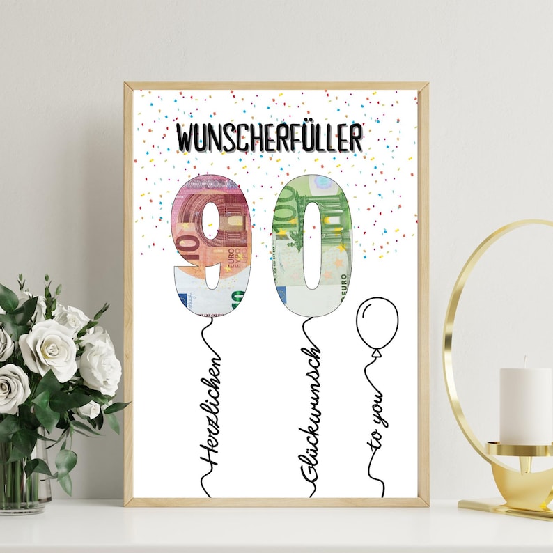 May include: A framed print with the text "WUNSCHERF&Uuml;LLER" at the top. The number "90" is designed as balloons filled with Euro banknotes. The words "Herzlischen", "Gl&uuml;ckwunsch", and "to you" are written in cursive below the numbers. Confetti dots the background.