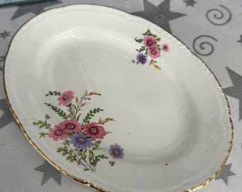 Salsera con diseño de primavera de Homer Laughlin para debajo del plato