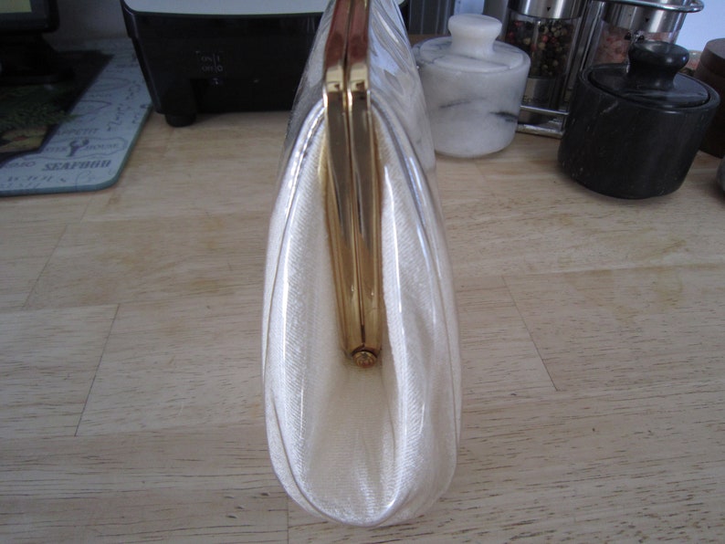 Plastic Floral Clutch Clear Coated Plastic