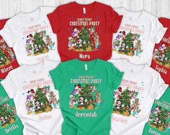 May include: A collection of short-sleeved t-shirts in red, white, and green. Each shirt features a graphic of Disney characters around a Christmas tree, with the text "Very Merry Christmas Party". Names are printed below the graphic.