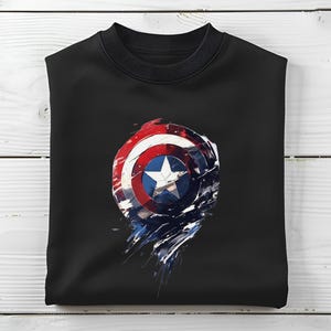 a black shirt with a captain's shield painted on it