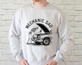 Camiseta de Papá Mecánico con Esqueleto en el Garaje - Camiseta Divertida para Amantes de los Autos