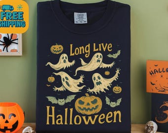 May include: Navy blue crew neck t-shirt with a Halloween-themed design. The graphic features cartoon ghosts, pumpkins, and bats, with the words "Long Live Halloween" in a vintage style.
