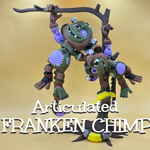 May include: Two articulated brown and green chimp figures with purple belly patches, button eyes, and silver bolts on their heads, hanging from a brown tree branch stand. One chimp holds a yellow banana. Text reads: ARTICULATED FRANKEN CHIMP.