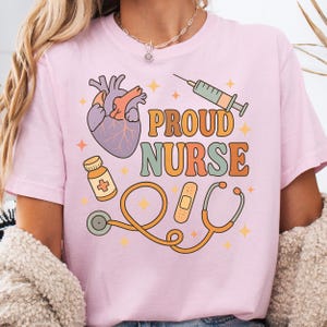 Proud Nurse shirt for women, retro stethoscope heart RN tee, cute pastel nurse gift, nursing school student graduation shirt