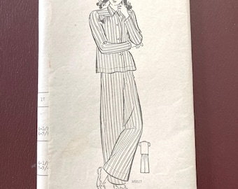 1940s misses pajamas sewing pattern 9517.  Neatly folded.  Pattern pieces are in good vintage condition.  A 1940s size 12 which is bust 32"